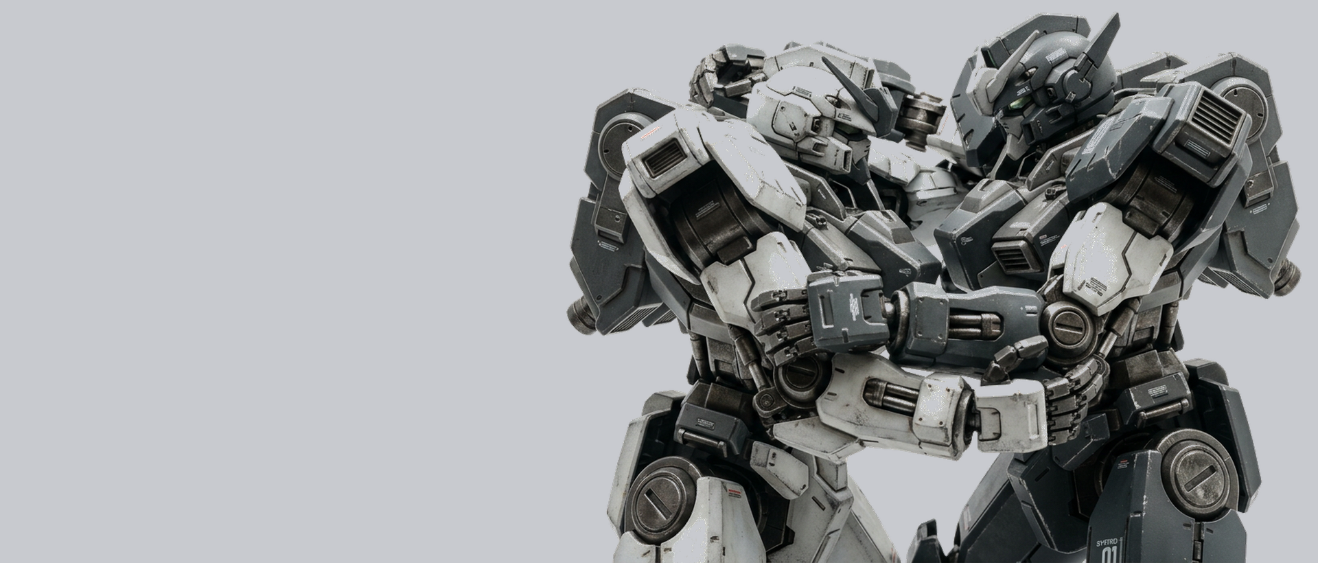 Two duel mechs locked in combat